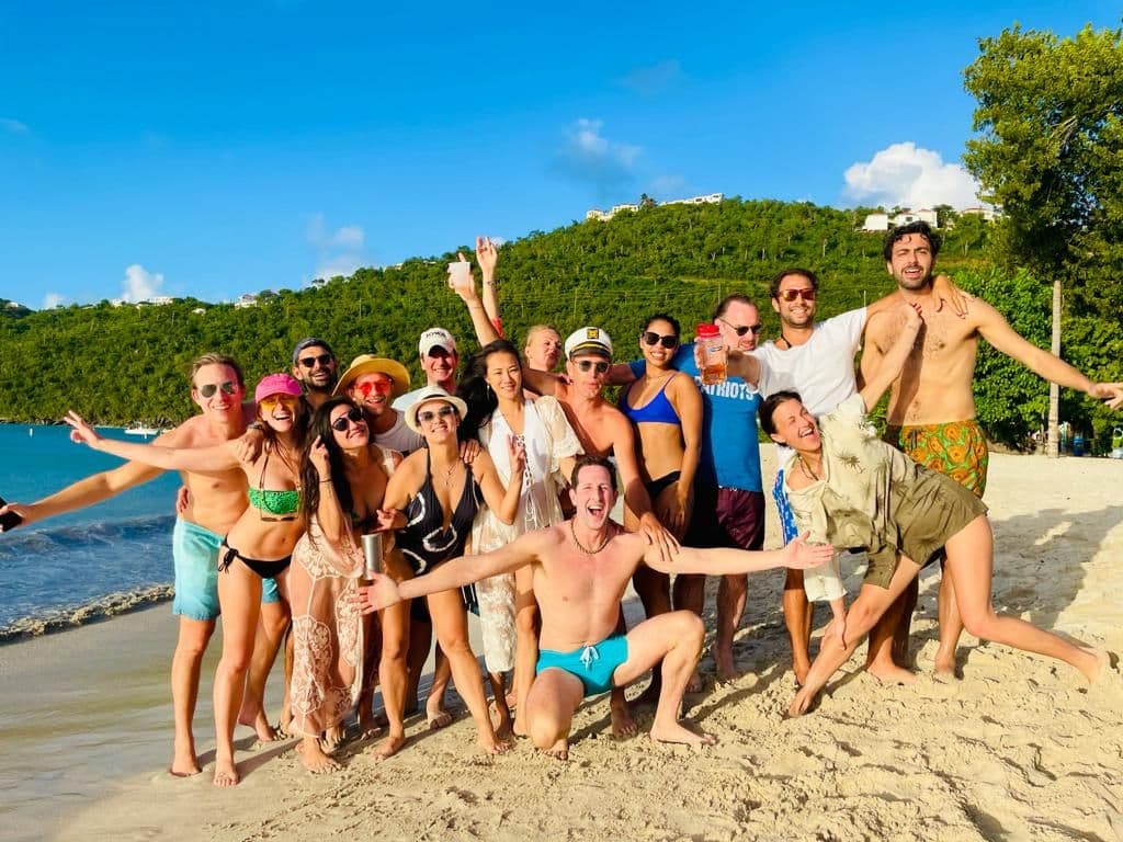Group celebrating on a Caribbean beach