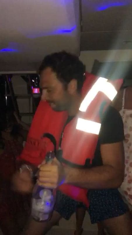 Dancing in the cabin, life vest and all