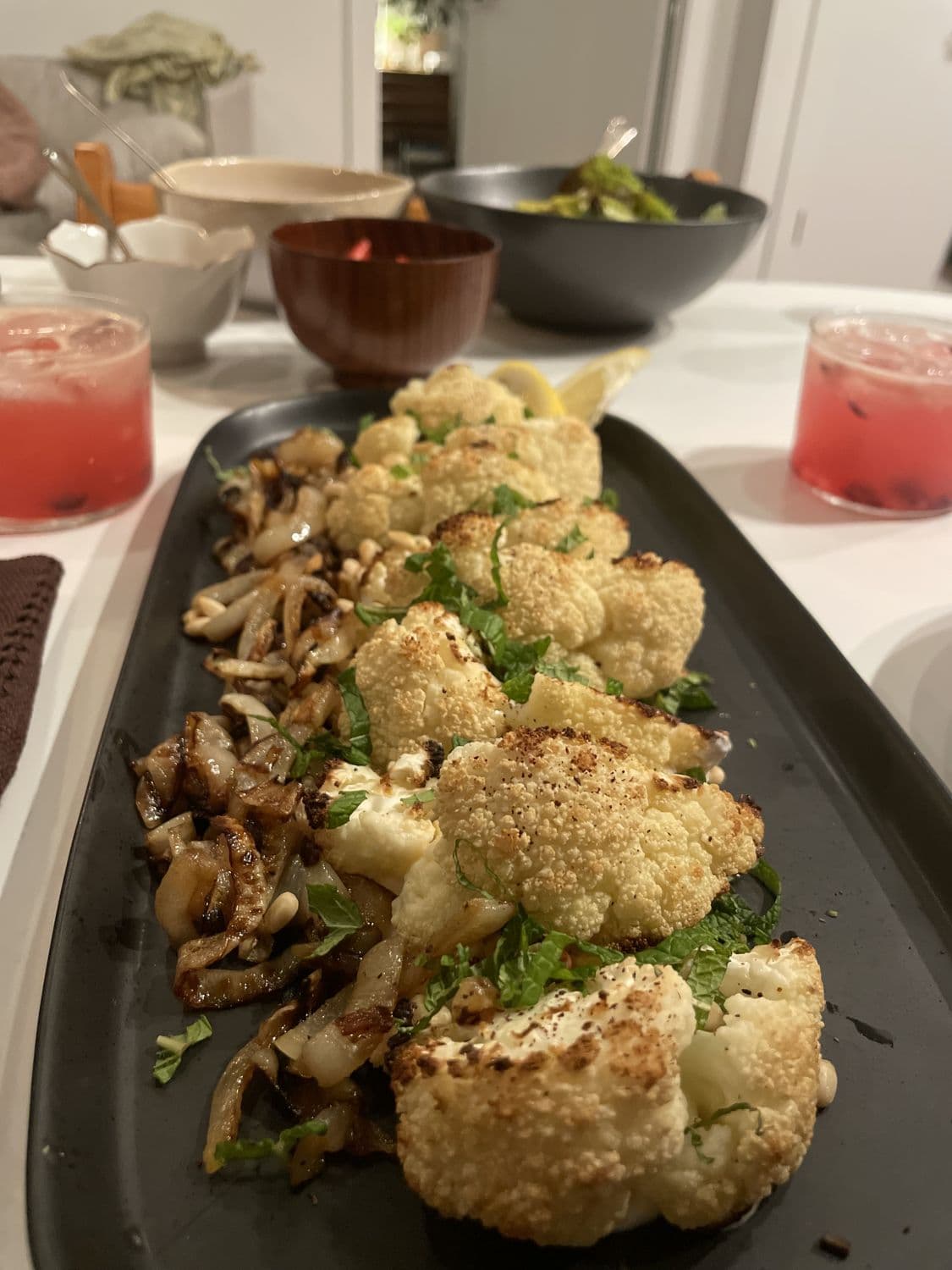 Roasted cauliflower dish plated for service