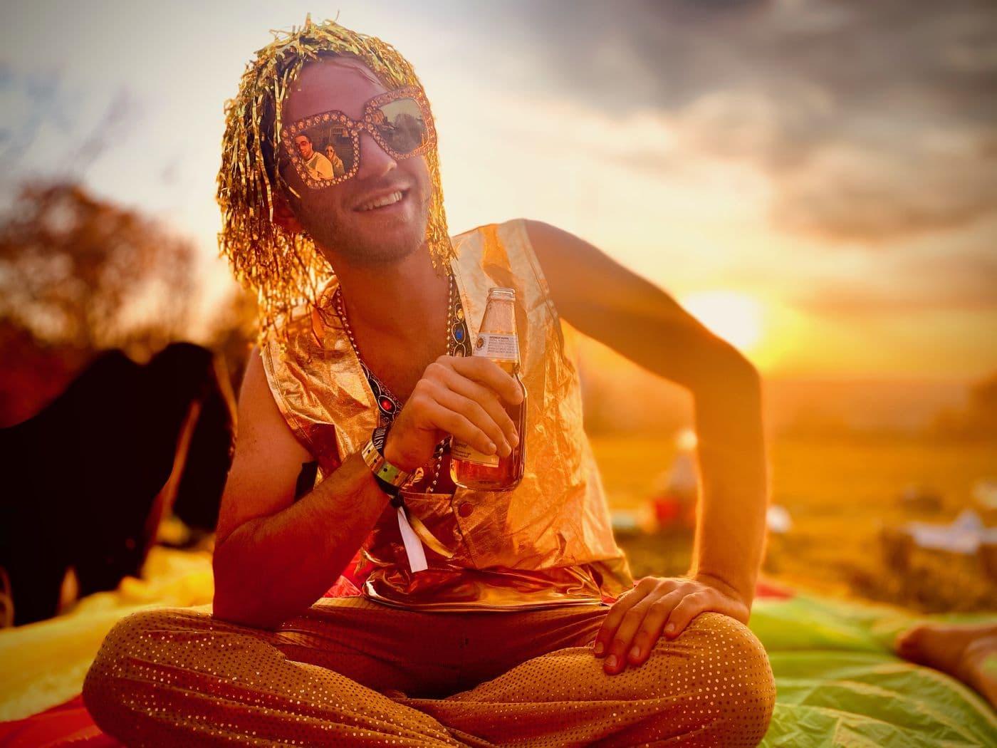 Golden hour portrait wrapped in a blanket