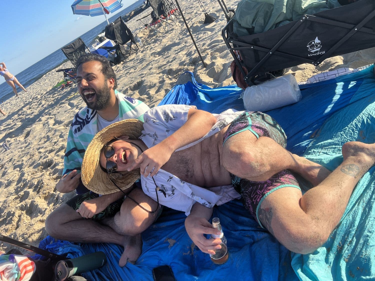 An afternoon nap in the shade at Rockaway Beach