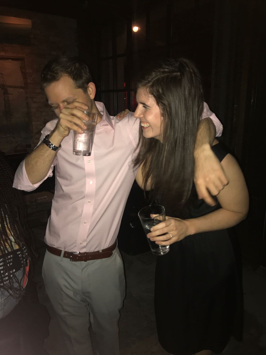 Two guests holding each other up as the night goes sideways
