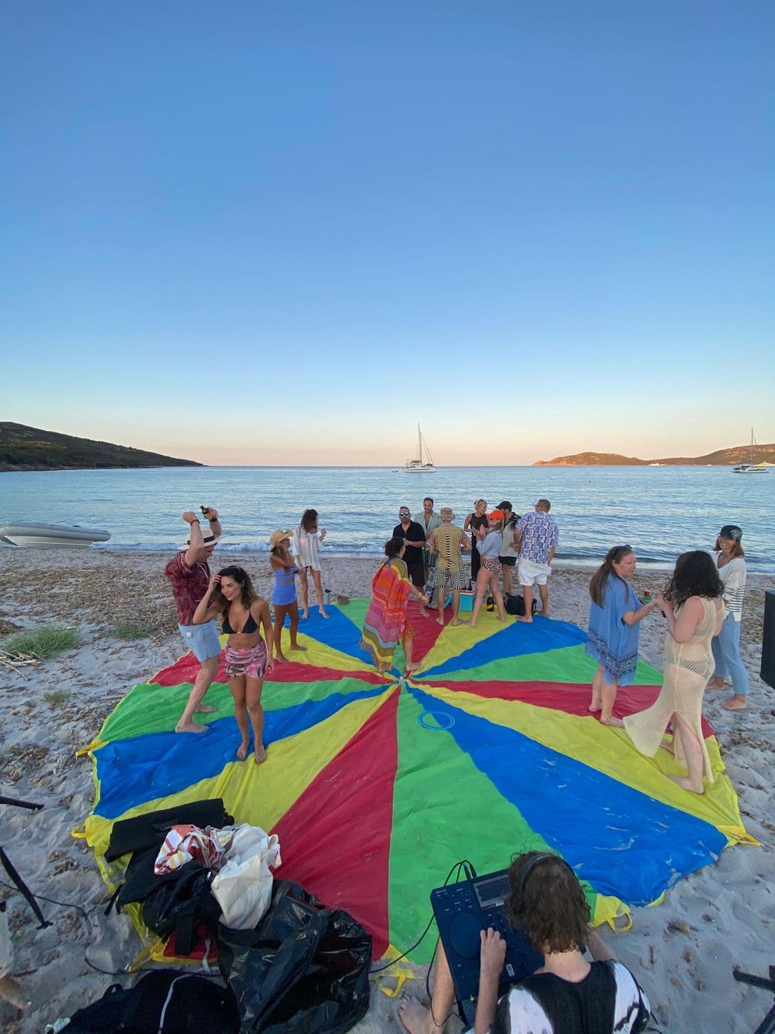 Parachute games at a Mediterranean beach party