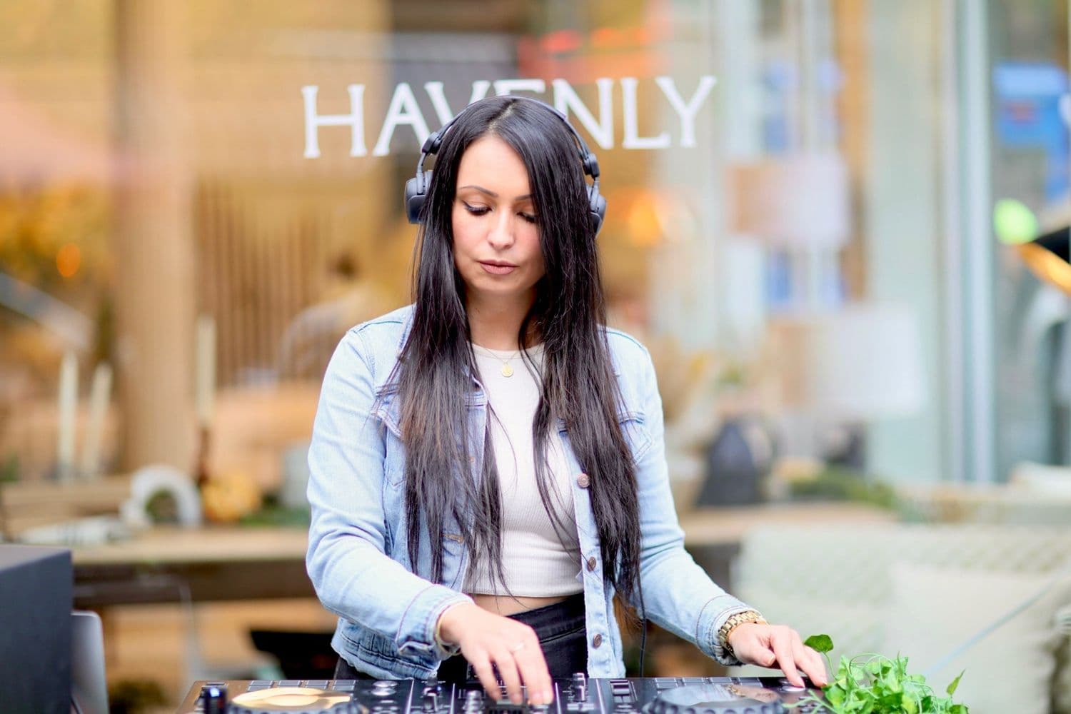 A resident DJ playing the showroom launch