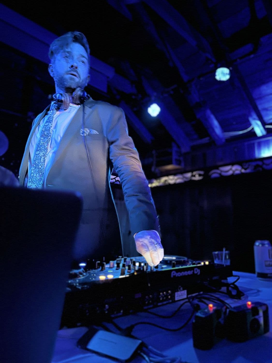 Working the booth under blue wash lighting