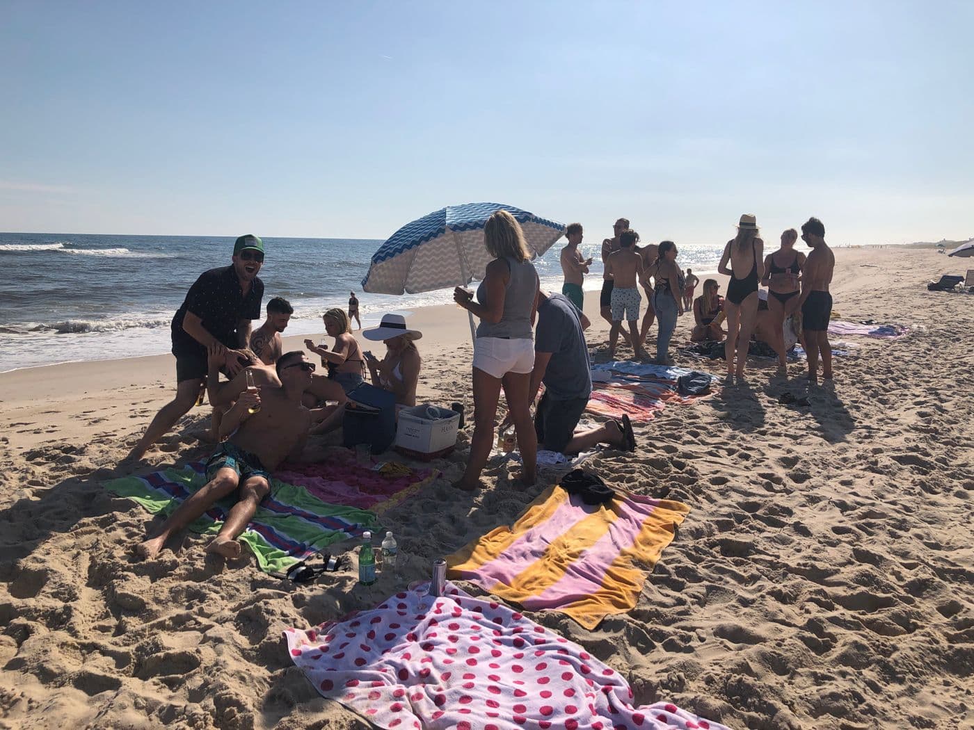 Umbrellas and towels at a Long Island beach day