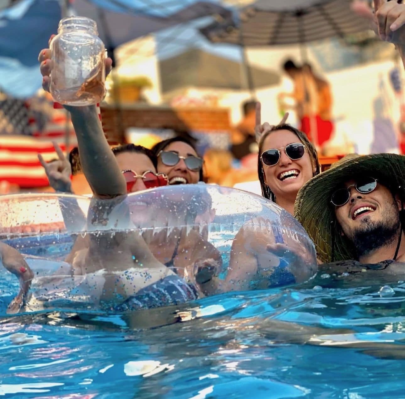 Pool party with a flag and floaties